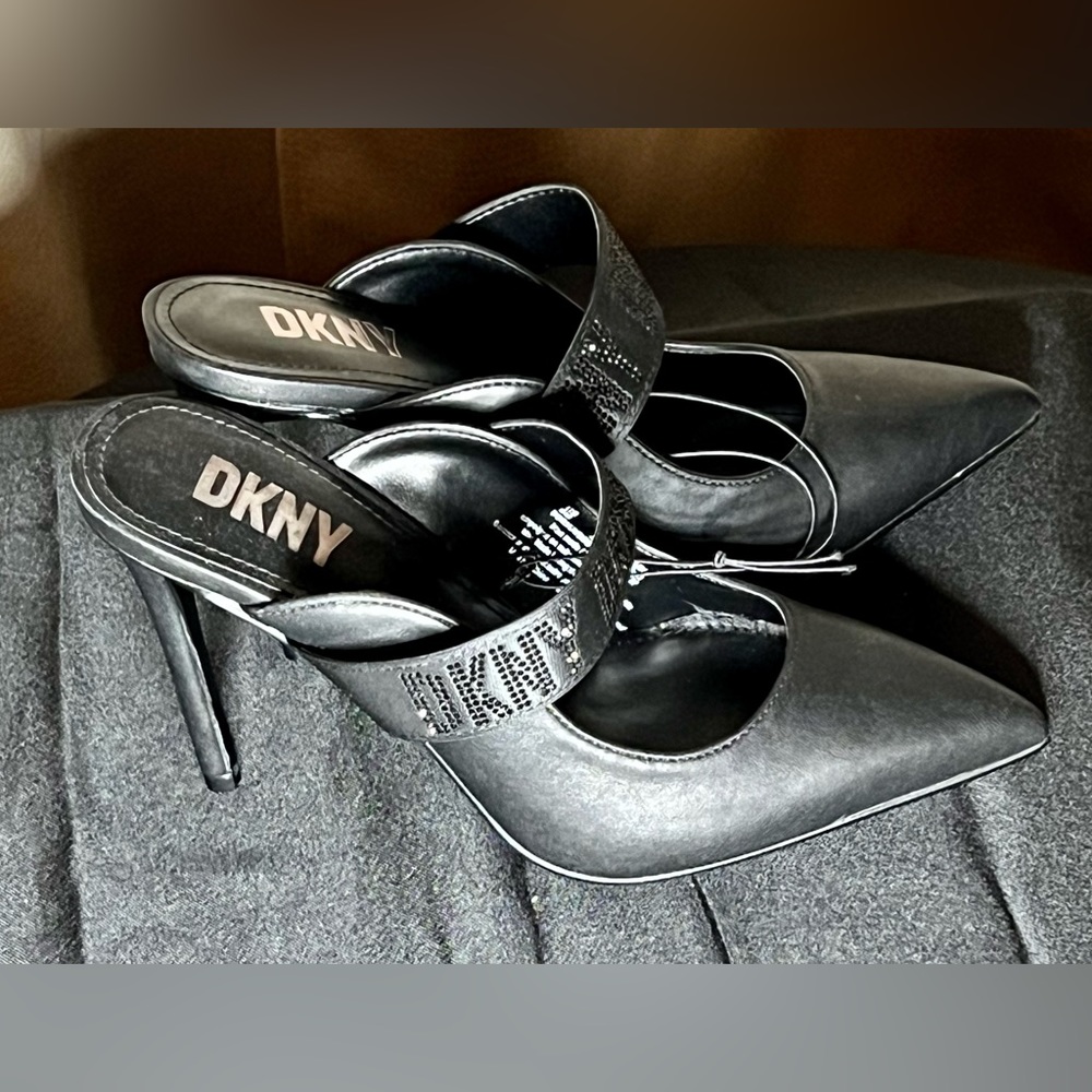NWOB DKNY Black strapless stilettos. Women’s size 6m. DKNY emblem on straps.